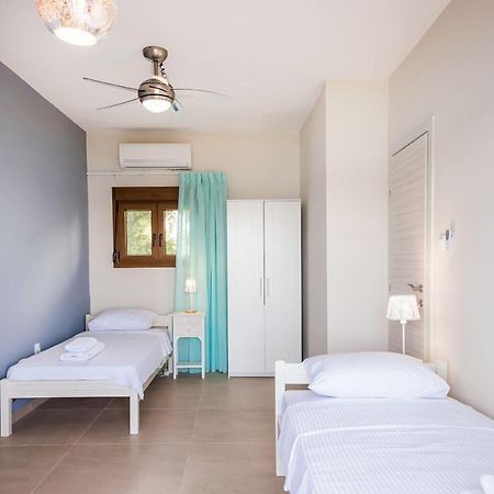 Nereus & Oceanus Beachfront Apartments, Lagonisi Beach #Feelslikehome Ormos Panagias Bagian luar foto